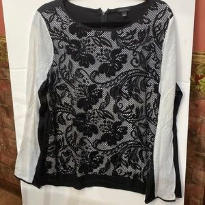 Gently used Ann Taylor sweater with rayon material in back with zipper in large